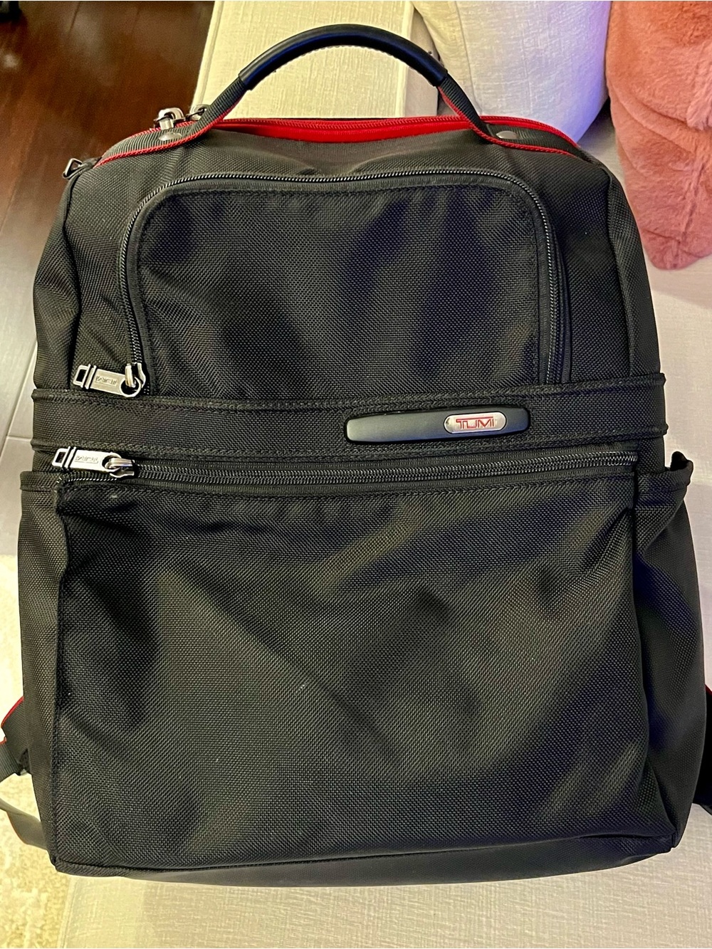 Tumi Black Backpack with Red Trim